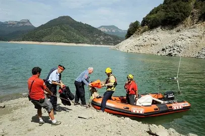 Unas 120 personas entre voluntarios y emergencias rastrean el pantano de Susqueda