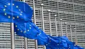 European flags fly at half-mast to pay tribute to the victims of the attacks in Nice
