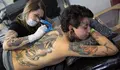 Feria del tatuaje en Brasil abre con un concurso de belleza y nuevas tendencias